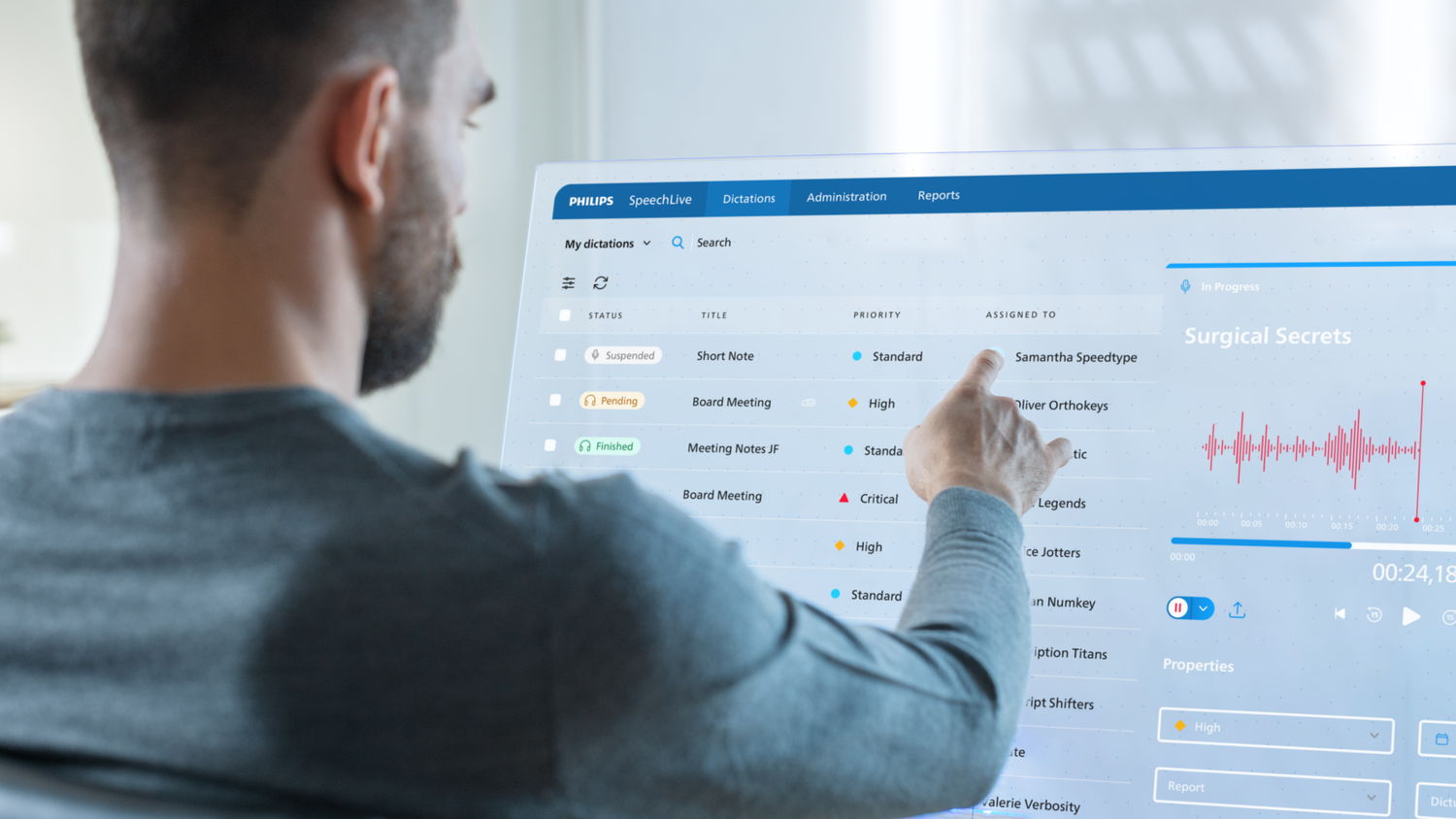 Large-philips-speechlive_futuristic-office-man-using-transparent-computer-display_istock-971401302.png__PID:d9d89884-59c7-458a-aa71-69f04b81e481